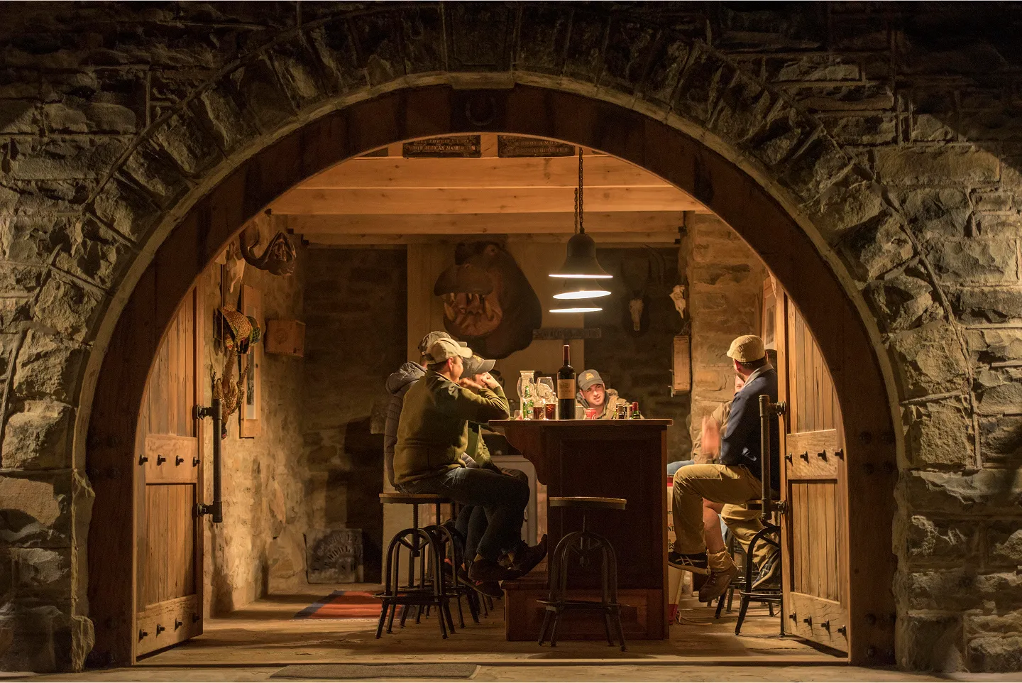 Hunters talking and having wine in South Africa